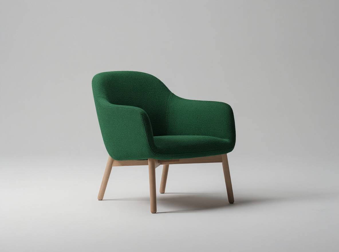 Change only the armchair upholstery color from muted beige to deep forest green. Preserve the exact chair shape, seams, fabric texture, wooden legs, camera angle, framing, background, lighting, and shadows. Do not add or remove anything. No text.